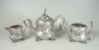 VICTORIAN SILVER THREE PIECE TEA SET, comprising teapot, sucrier and cream jug overall repousse