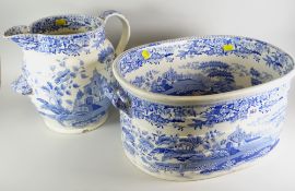 LARGE 19th CENTURY POTTERY TRANSFER PRINTED BLUE & WHITE JUG AND TWIN-HANDLED OVAL FOOT BATH,