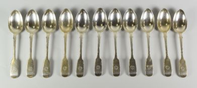 SET OF ELEVEN VICTORIAN SILVER FIDDLE PATTERN DESSERT SPOONS, with engraved initial 