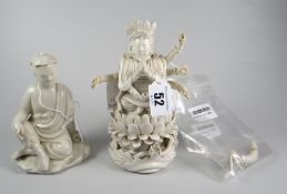 TWO CHINESE BLANC DE CHINE FIGURES one depicting a Deity praying with many arms together with