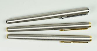 THREE VINTAGE PARKER ARROW FLIGHTER FOUNTAIN PENS one with brushed stainless steel finish & chrome