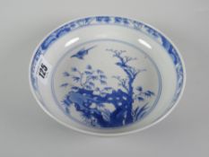 CHINESE PORCELAIN BLUE & WHITE PEDESTAL CIRCULAR SHALLOW DISH OR BOWL decorated with birds amongst
