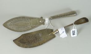 TWO SIMILAR SILVER PIERCED FISH SERVERS, one London 1822 with engraved seated dog by William