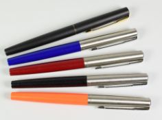 FIVE MODERN PARKER 15 FOUNTAIN PENS one each of blue, black, red & neon orange, all with stainless