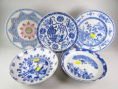 FIVE CHINESE PORCELAIN PLATES to include four blue & white including dragon plate, figural plate,