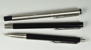 THREE MODERN PARKER VECTOR PENS including one stainless steel rollerball pen (engraved '