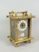 EARLY TWENTIETH CENTURY BRASS BAMBOO DESIGN CARRIAGE CLOCK the front & side panels decorated with