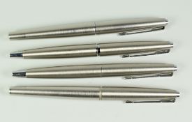 FOUR VINTAGE STAINLESS STEEL PARKER 45 FLIGHT FOUNTAIN PENS two with silver tail caps (late 60s /