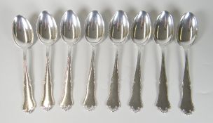 SET OF EIGHT NORWEGIAN SILVER SPOONS of shell and scroll design. Hallmarked 