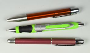 THREE MODERN PARKER PENS including one lime green Parker Contact ballpoint pen, one aubergine Parker