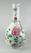 CHINESE PORCELAIN FAMIILLE VERTE BOTTLE VASE decorated with flowers, foliage & butterfly, concentric