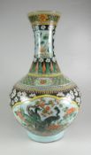 CHINESE PORCELAIN FAMILLE VERTE TURQUOISE GROUND ONION-SHAPED VASE decorated with fantastic bird