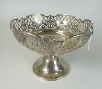 GEORGE V SILVER CIRCULAR PEDESTAL BOWL having pierced foliate and scroll rim. Birmingham 1912,