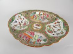 CHINESE PORCELAIN FAMILLE ROSE LOBED OVAL SHALLOW DISH decorated with bird and figural panels within