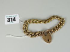 9CT YELLOW GOLD FLAT LINK CURB BRACELET with heart shaped padlock. 27.2 grams approx. Condition