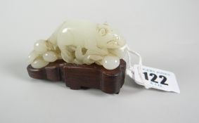 BELIEVED CHINESE JADE CARVED STUDY OF A RAT on naturalistic base raised on hardwood stand, 5cms high