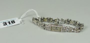 ART DECO WHITE METAL LADIES DIAMOND ENCRUSTED COCKTAIL WATCH the reverse of the watch head