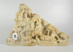 CARVED ORIENTAL SOAPSTONE LANDSCAPE depicting pagodas, pine trees & figures, unmarked, 20cms high