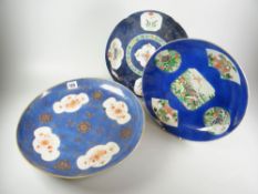 THREE ORIENTAL PORCELAIN COBALT BLUE DISHES all with various lion dog floral & foliate panels, the