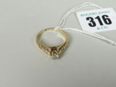 14K YELLOW GOLD DIAMOND SOLITAIRE RING, the round brilliant diamond approximately 0.25 cts, weighing