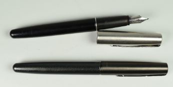 TWO MODERN PARKER FRONTIER PENS one black barrelled fountain pen, one gunmetal fibre tip with