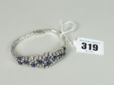18CT WHITE GOLD SAPPHIRE & DIAMOND LADIES BRACELET the eleven sapphires surrounded by forty-seven