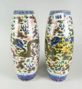 PAIR OF CHINESE PORCELAIN DRAGON VASES depicting four-claw dragon chasing flaming pearl within cloud