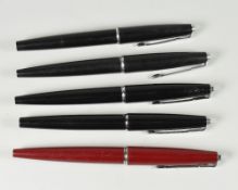 THREE VINTAGE PARKER 45 FOUNTAIN PENS one red, two black, two early 70s Parker 'New Slimfold',