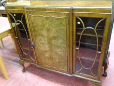 A good vintage walnut side-by-side display cabinet with central cupboard door & interior