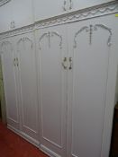 Pair of cream French style double wardrobes with top storage cabinets