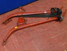A pair of red painted horse hames