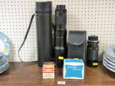 Camera lenses including Sigma long lens in a case and a Tamron etc