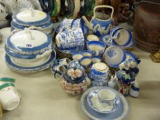 A mixed quantity of willow & other blue & white decorated tea, dinner & ornamental ware