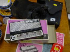 A boxed Stylophone, a pair of binoculars etc