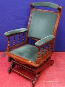 An American-style upholstered rocker, retailed by John Jones, Liverpool circa 1910