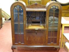 A double dome top vintage walnut side-by-side bureau