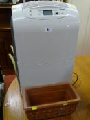 An Igenix dehumidifier & a rectangular pottery planter E/T