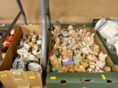 A box of Hummel-type figures & a collection of Pendelfin rabbits & other animal figures