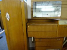 A mid-century lightwood three-piece bedroom suite