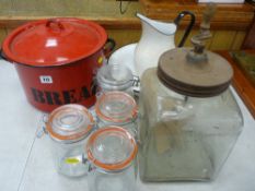 A red enamel bread bin, enamel basin and jug set, provision containers etc