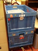 A wheeled trolley with two large volume folding plastic crates
