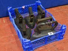 Six vintage cast iron flat irons