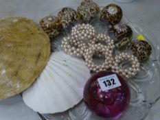 Cowrie shell napkin rings, glass paperweight and similar items