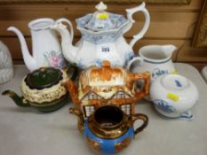 A collection of vintage teapots, two Royal Doulton jugs in blue & white