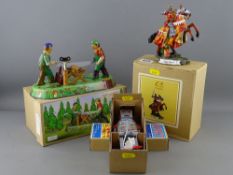 Two modern tin plate toys - both clockwork action with keys & a mounted composite model of knight in