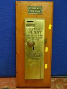 A vintage Etas No. 5 penny in slot public toilet door set