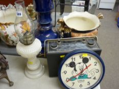 A Victorian-style oil lamp, a vintage Hacker Herald radio & a Mickey Mouse quartz wall clock