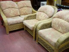 A good wicker three-piece conservatory suite with upholstered cushion seats & backs