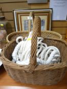 Two vintage wicker baskets, a quantity of prints etc