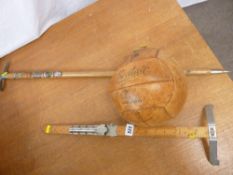 A vintage Beatall football, a dressmaker's measuring stick & a Swiss-type walking stick in the